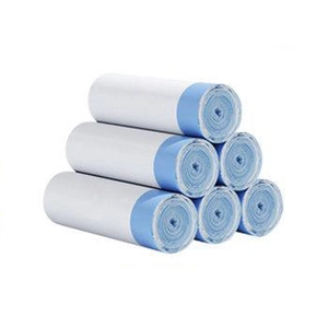 Stack of six rolls of thickened white drawstring trash bags for kitchen and home use
