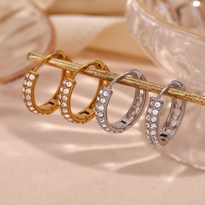 Dual row zirconia hoop earrings in 18K gold and silver plating with hollow heart detail
