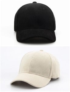 Detailed texture of corduroy baseball caps in black and cream white colors