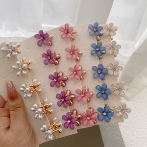 Mini pearl flower hair claws in colorful resin with sparkling rhinestones and gold clips