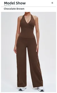 Chocolate brown yoga set featuring a cross-neck sports bra and high-waisted wide-leg pants