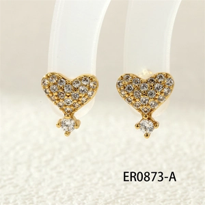 Macro view of gold heart stud earrings with white zircon micro-pave and large crystal