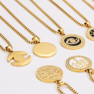 Golden stainless steel necklaces featuring zircon heart and evil eye pendant designs