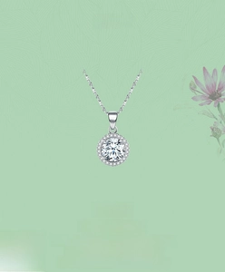 Close-up of a halo pendant s925 silver necklace with sparkling round-cut zircon stone