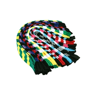 Detailed view of colorful striped and checkered knee-high knitted cotton socks