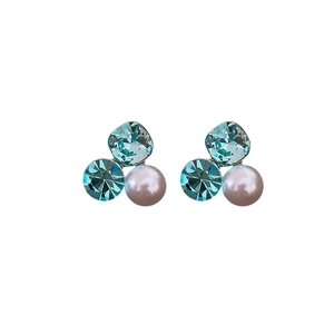 Elegant silver stud earrings with blue crystals and round white pearls in a trio design