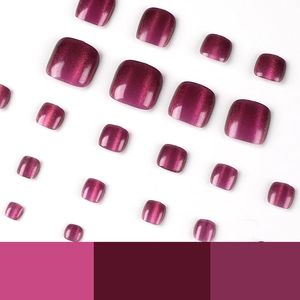 Cat-eye magnetic press-on toenails in deep burgundy with a glossy finish and various sizes