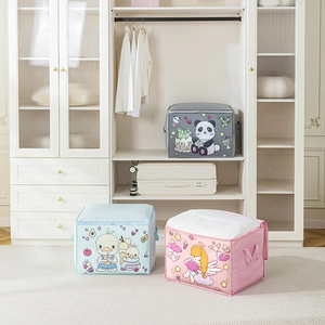 Detail of cartoon printed storage bags with reinforced handles and dual zipper closure