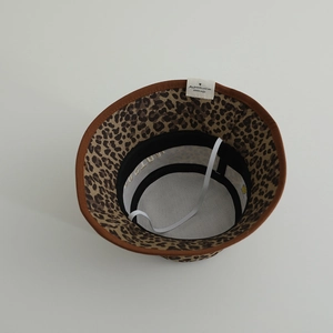 Internal view of leopard print bucket hat with adjustable elastic strap and soft lining