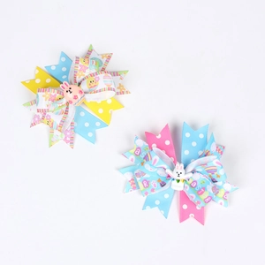 Detail of Easter hair bows with 3D resin bunnies and Happy Easter ribbon prints
