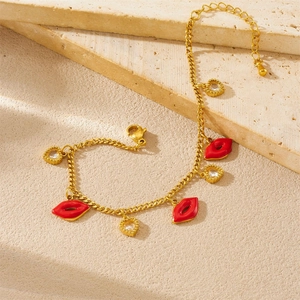 Golden stainless steel chain bracelet with red lip pendants and heart-shaped zircon stones