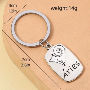 Silver Aries zodiac keychain dimensions shown at 7cm length and 3cm width on a neutral base