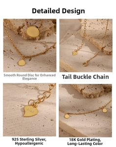Macro detail of 18K gold plated S925 sterling silver round pendant and heart clasp