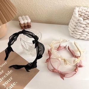 Elegant tulle bow headband available in black, cream white and dusty pink for women