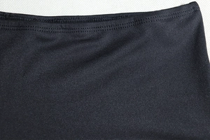 Macro detail of black high-elastic fabric with premium double-needle stitching quality