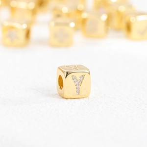 18k gold plated cube pendant with zircon letter Y inlay on white background