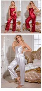 Detail of silk satin camisole and pants set with V-neck and luxurious glossy texture