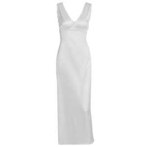 Detail of white satin dress with deep V-neckline and delicate lace trim accents
