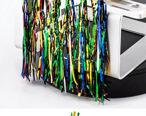 Close-up of vibrant multicolored metallic fringe tassels hanging on a silver metal stand