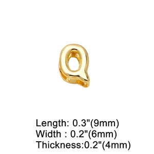 Detailed macro view showing letter Q gold pendant dimensions with measurements in inches