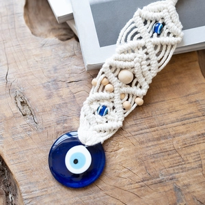 Handmade macrame Evil Eye wall hanging with blue glass and wooden beads home decor