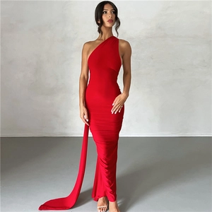 Detail of red one-shoulder evening dress with a slim fit and elegant side flowing sash