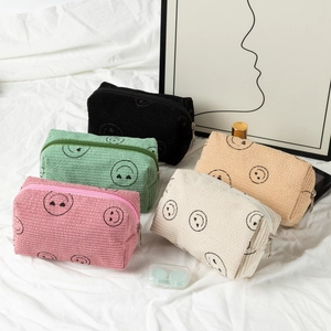 Three-piece corduroy cosmetic bag set with smiley face embroidery and heart-shaped eyes