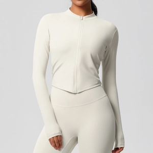 Ensemble de yoga blanc crème pour femme avec veste zippée ajustée et legging taille haute