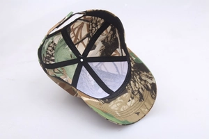 Detail view of the interior lining, sweatband and adjustable strap of camo baseball cap