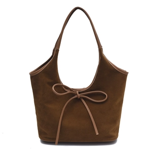Dark brown suede tote bag with bow detail and large capacity shoulder strap design