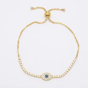 Adjustable gold evil eye bracelet featuring blue and white zircon stones on thin chain