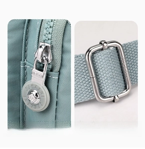Detailed view of custom metal zipper pull and adjustable strap on waterproof nylon bag