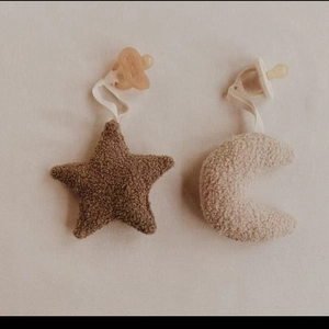 Plush teddy fleece star and moon pacifier clip set in warm earth tones for baby