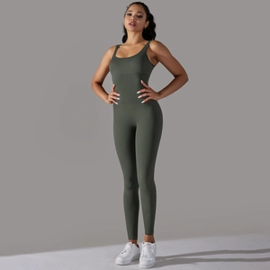 Detail of olive green seamless ribbed jumpsuit for yoga with tight fit and U-neck design