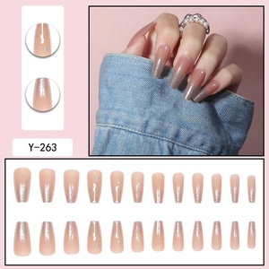 Nude pink gradient coffin press-on nails with silver glitter and 3D metal droplet accents