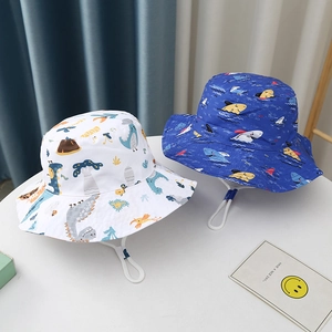 Kids wide brim sun hats featuring colorful cartoon dinosaur and blue shark patterns
