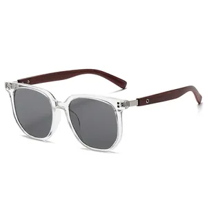 Fashionable square sunglasses with transparent frames and walnut wood grain temples