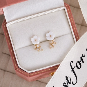 Pink shell flower stud earrings with sparkling zircon leaves in a luxury gift box