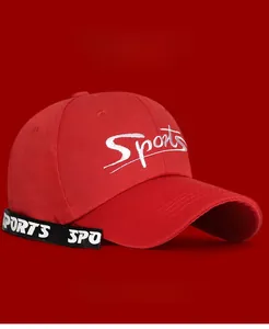 Macro shot of red cotton twill baseball cap with white 3D Sports embroidery and long strap