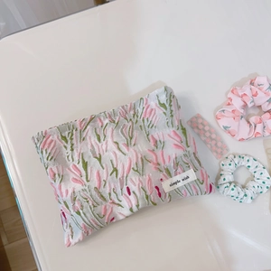 Pink heart canvas makeup bag with soft textured embroidery and zipper closure