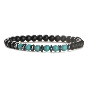 Natural tiger eye and black gallstone beaded bracelet with silver spacers on white background
