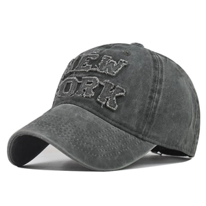 Detail of NEW YORK letter embroidery on vintage washed cotton baseball cap