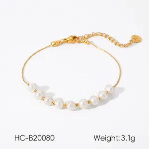 Macro view of French pearl bracelet with gold chain showing 14cm length and 3.1g weight