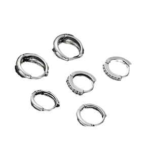 Three pairs of silver hoop earrings featuring polished finish and shimmering cubic zirconia stones