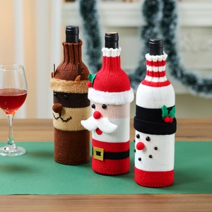 Knitted Christmas wine bottle covers featuring Santa, Reindeer and Snowman patterns