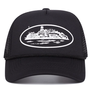Close-up of black mesh trucker hat featuring white oval island silhouette print