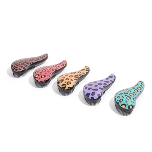 Ergonomic leopard print detangling hair brushes in five vibrant colors for all hair types