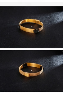 Detailed view of men's gold mesh bracelet featuring a curved plate and black silicone accents