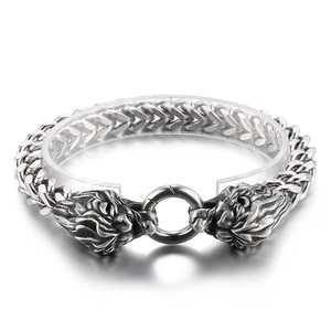 Vintage stainless steel lion head bracelet with heavy mesh chain and silver finish