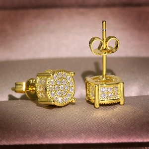 Detail of 925 sterling silver stamp on gold plated pave cubic zirconia stud earrings